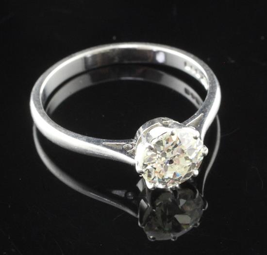 A platinum and solitaire diamond ring, size O.
